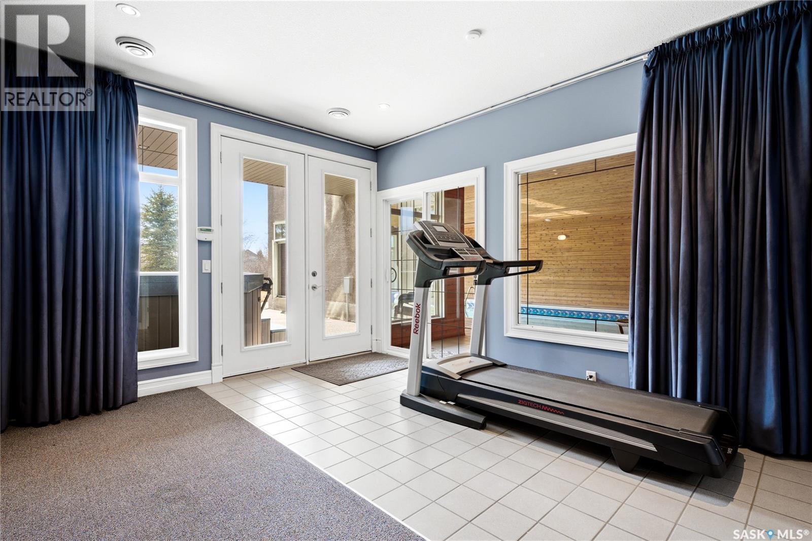 1514 Lakeridge Drive N, Regina, SK - Indoor Photo Showing Gym Room