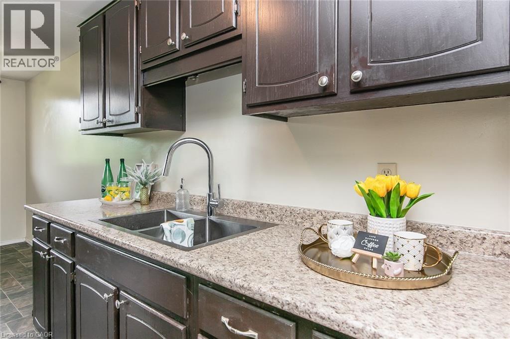 30 Avalon Place Unit# 203, Kitchener, ON - Indoor Photo Showing Kitchen With Double Sink With Upgraded Kitchen