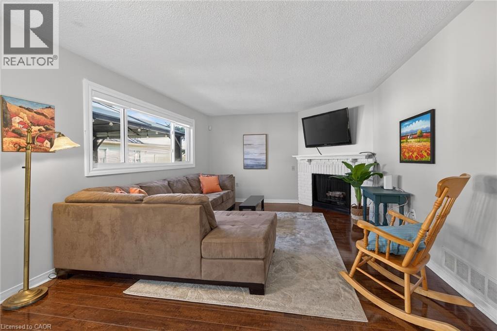 232 Silverbirch Boulevard, Hamilton, ON - Indoor Photo Showing Living Room With Fireplace