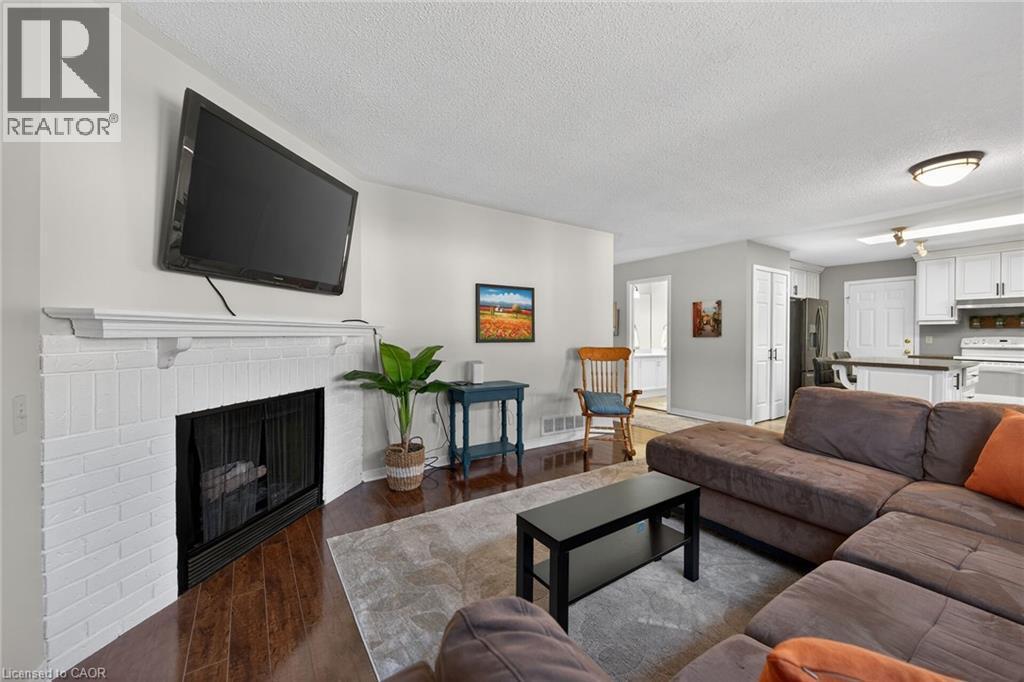 232 Silverbirch Boulevard, Hamilton, ON - Indoor Photo Showing Living Room With Fireplace