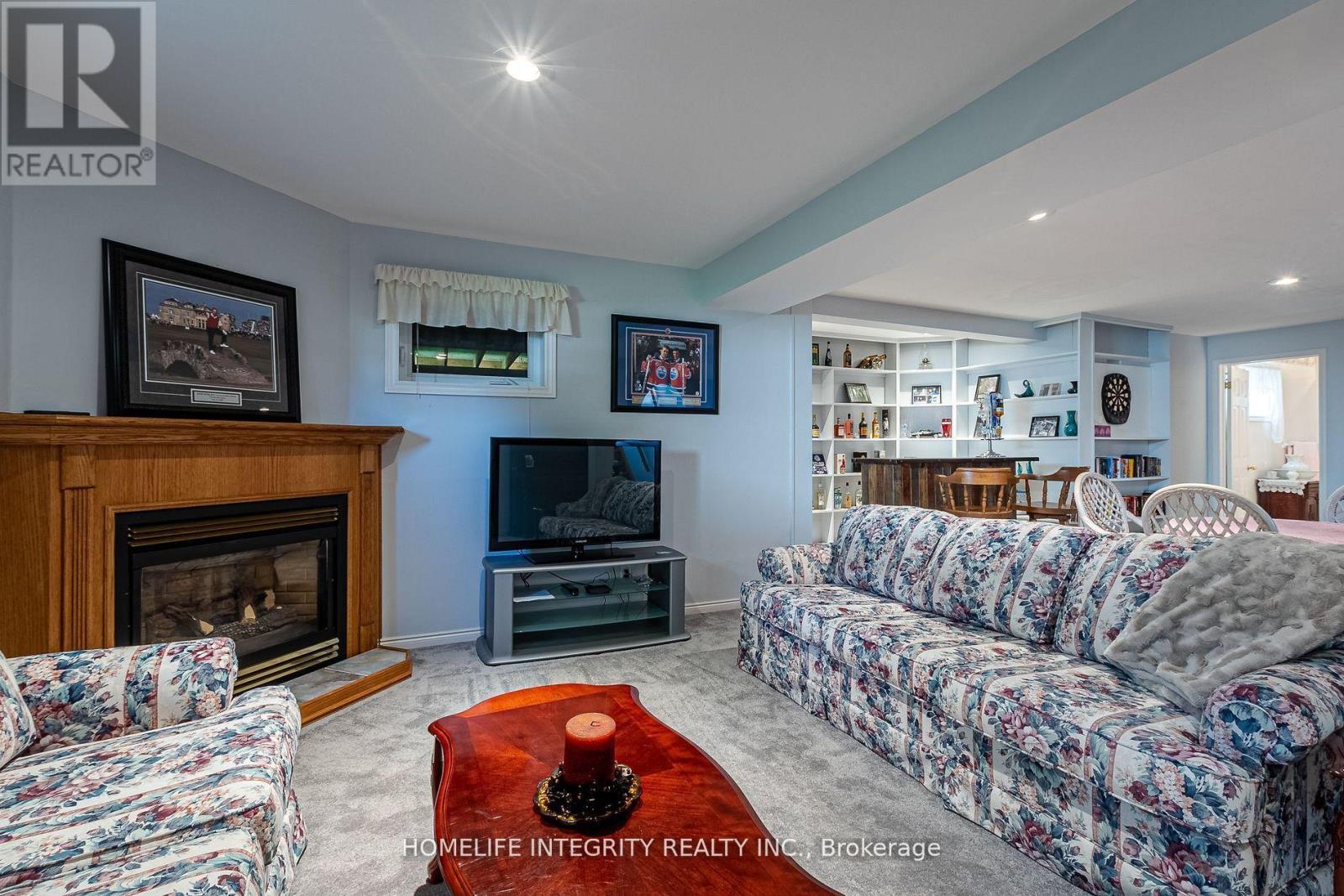 37 Brouwer Crescent, Wasaga Beach, ON - Indoor Photo Showing Living Room With Fireplace