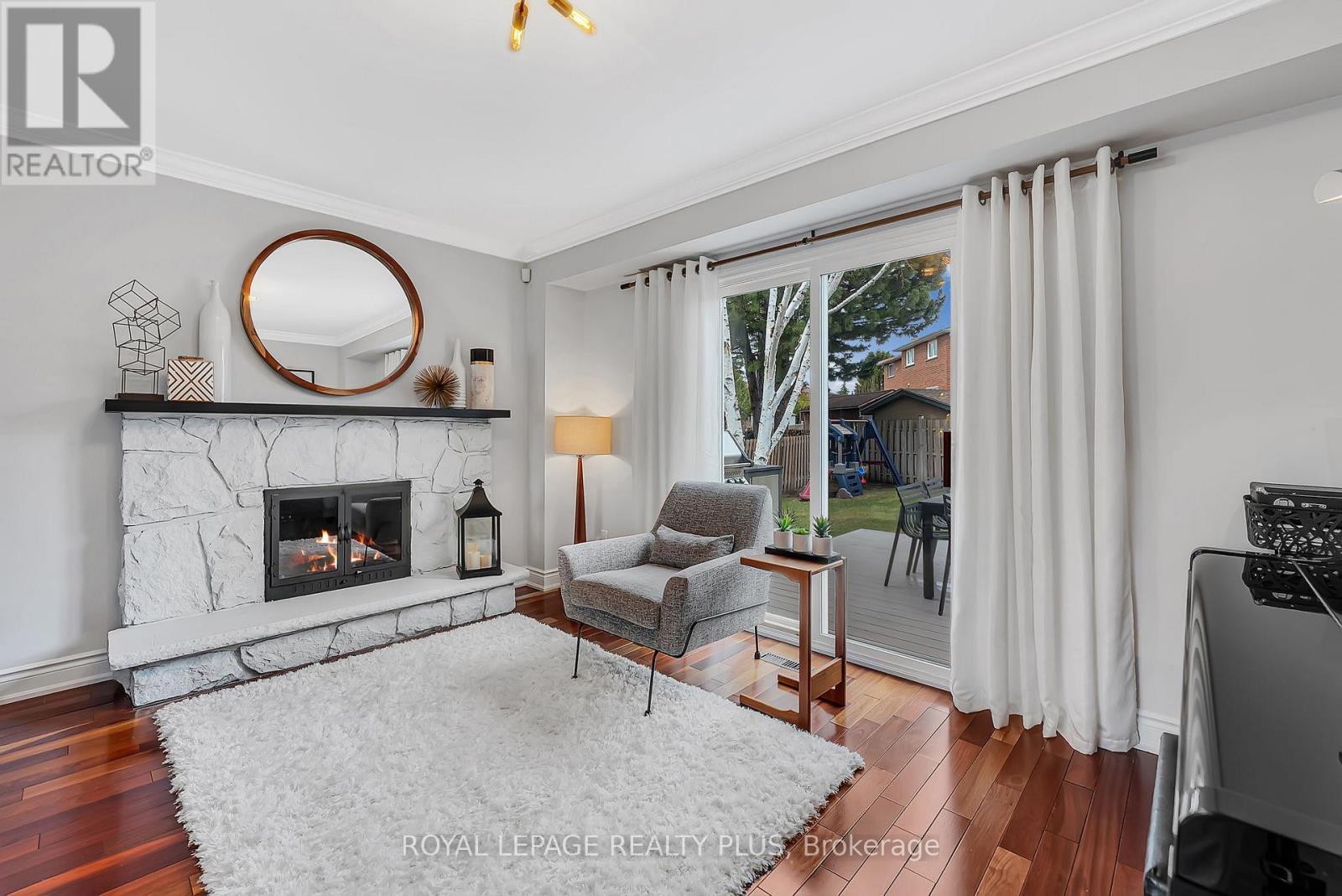 4241 Anworld Place, Mississauga, ON - Indoor Photo Showing Living Room With Fireplace