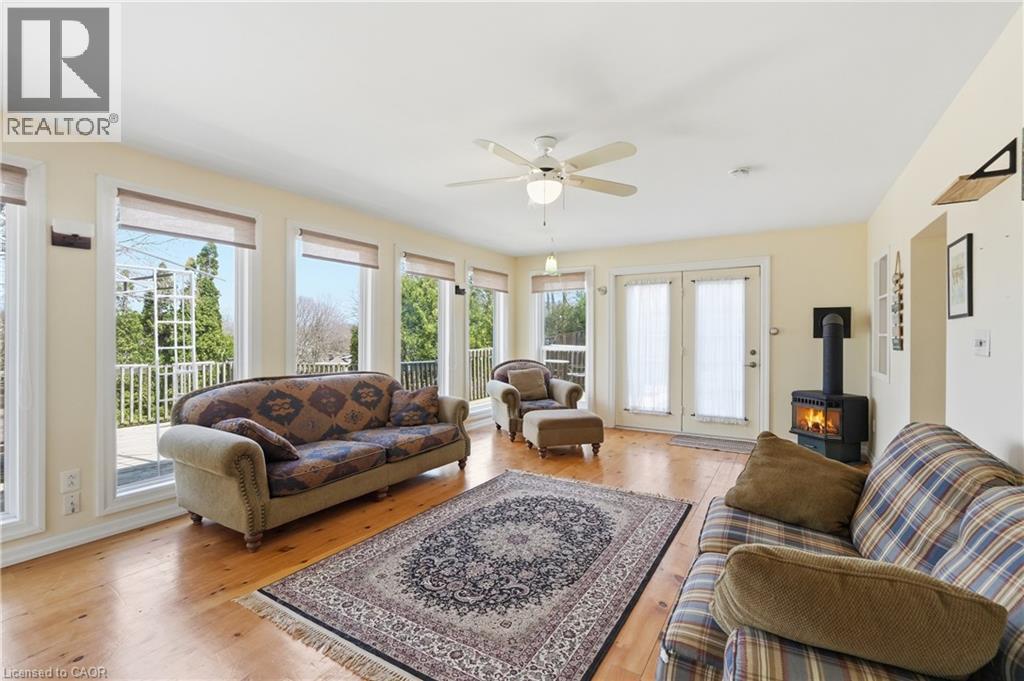 55 Berkley Crescent, Simcoe, ON - Indoor Photo Showing Living Room With Fireplace