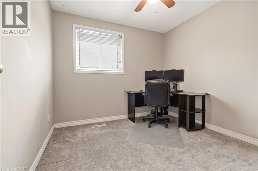 Room featuring a window with blinds, light-colored walls, and a ceiling fan - 2349 Middlesmoor Crescent, Burlington, ON - Indoor Photo Showing Office