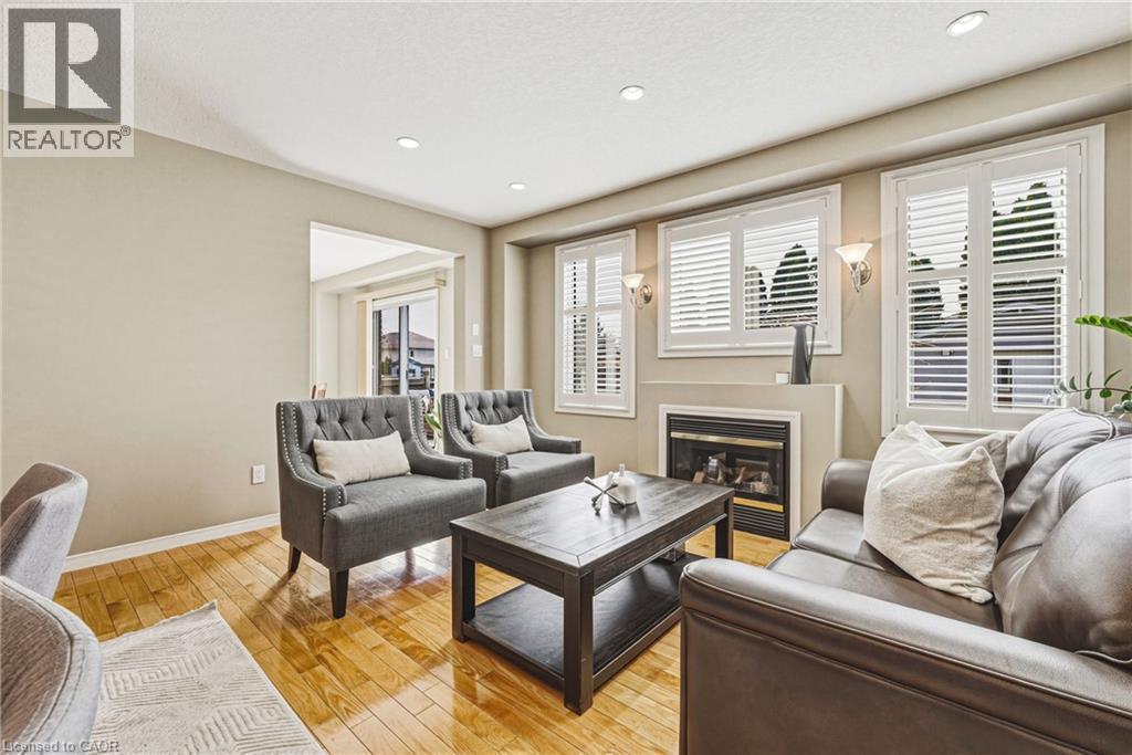 228 Holbeach Crescent, Waterloo, ON - Indoor Photo Showing Living Room With Fireplace