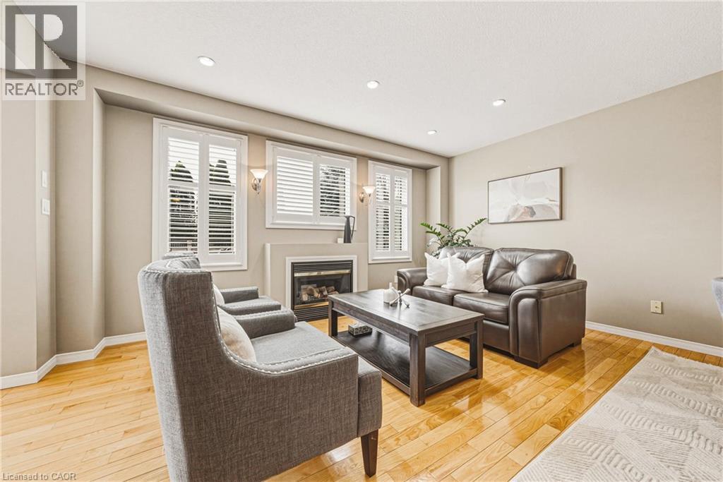 228 Holbeach Crescent, Waterloo, ON - Indoor Photo Showing Living Room With Fireplace
