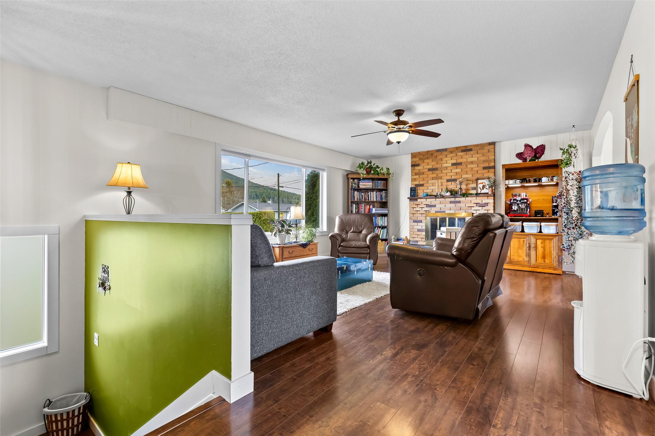 2107 Ash Street, Creston, BC - Indoor Photo Showing Living Room With Fireplace