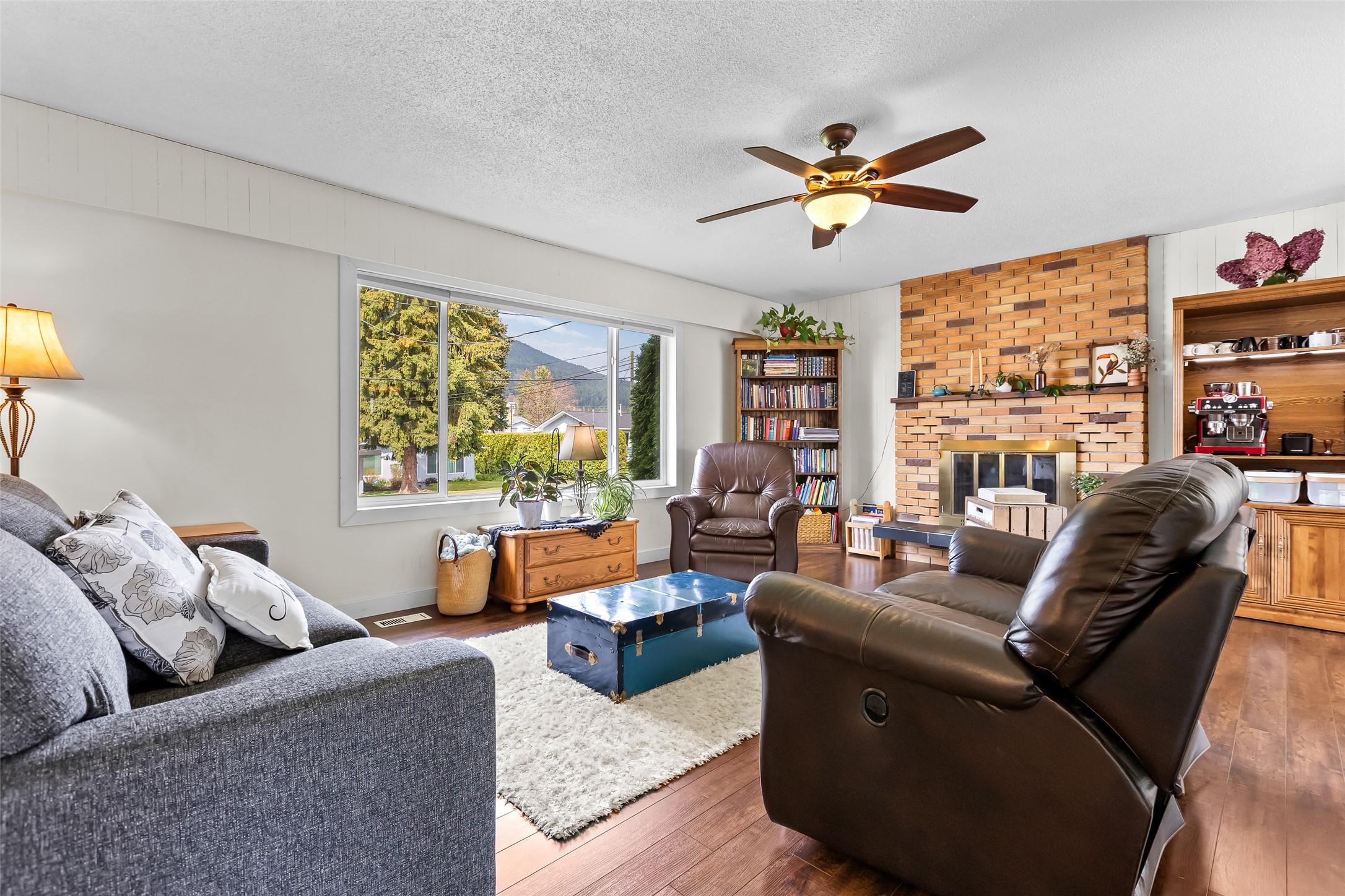 2107 Ash Street, Creston, BC - Indoor Photo Showing Living Room With Fireplace