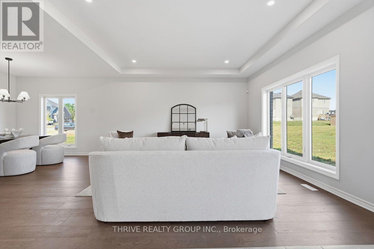 64 Basil Crescent, Middlesex Centre (Ilderton), ON - Indoor Photo Showing Living Room