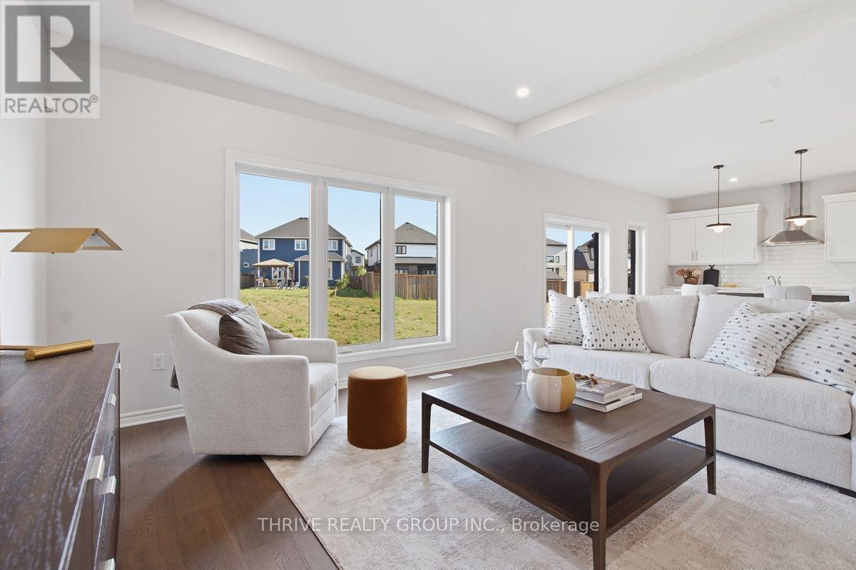 64 Basil Crescent, Middlesex Centre (Ilderton), ON - Indoor Photo Showing Living Room