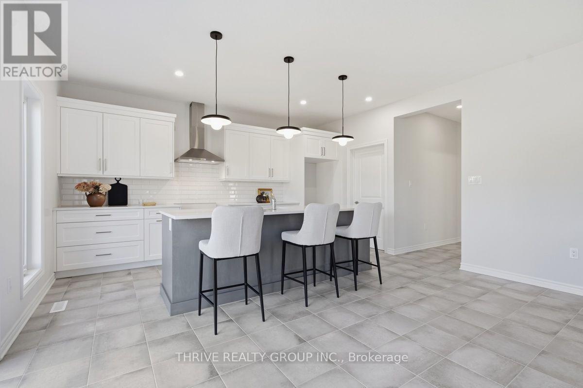 64 Basil Crescent, Middlesex Centre (Ilderton), ON - Indoor Photo Showing Kitchen With Upgraded Kitchen