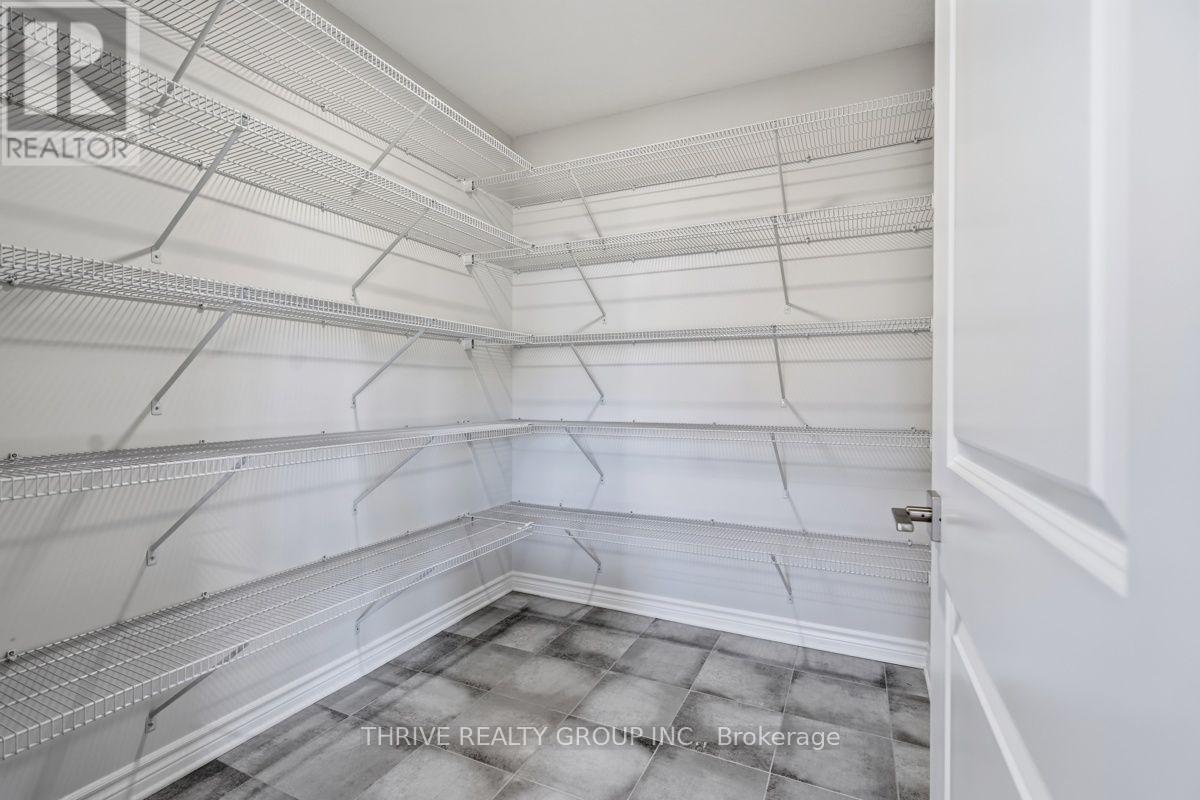 64 Basil Crescent, Middlesex Centre (Ilderton), ON - Indoor With Storage