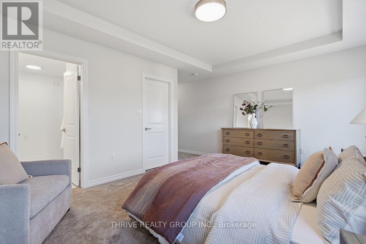 64 Basil Crescent, Middlesex Centre (Ilderton), ON - Indoor Photo Showing Bedroom