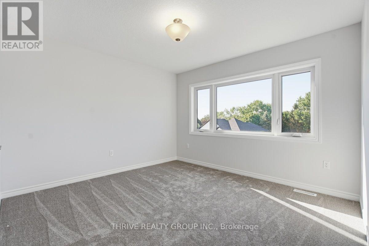 64 Basil Crescent, Middlesex Centre (Ilderton), ON - Indoor Photo Showing Other Room