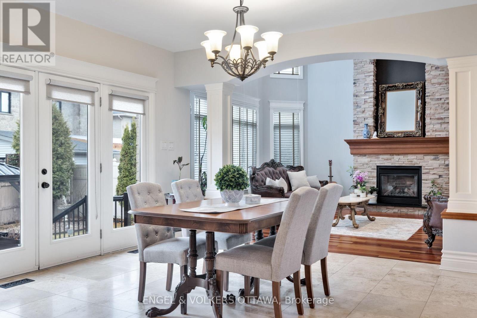 453 Rahul Crescent, Ottawa, ON - Indoor Photo Showing Dining Room With Fireplace