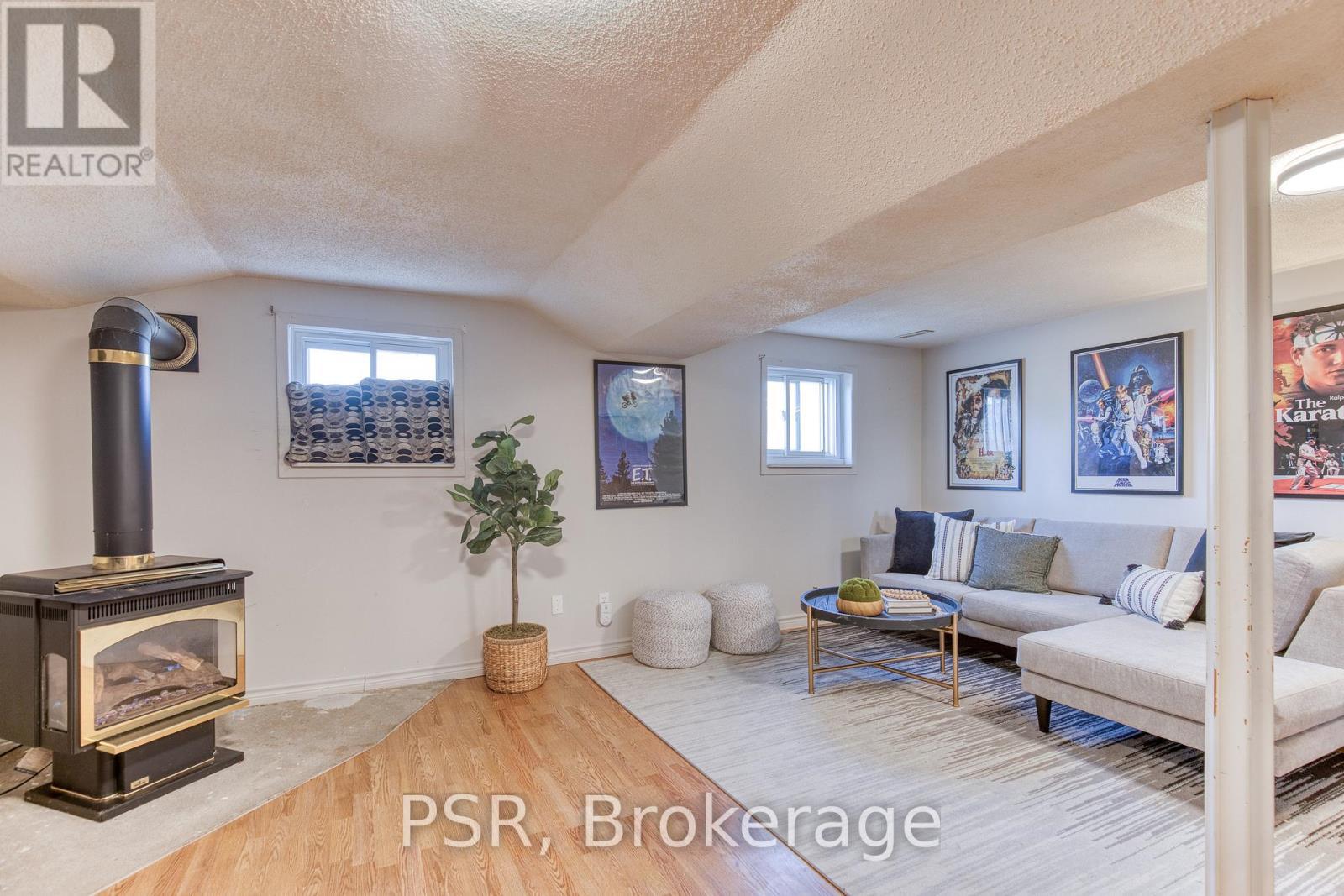 231 Heritage Drive, Kitchener, ON - Indoor Photo Showing Living Room With Fireplace