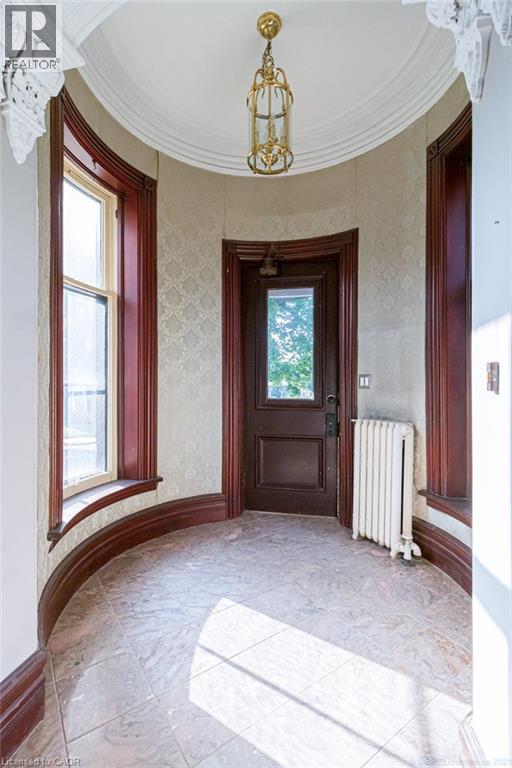 Front entrance to lobby w/ access to main, 2nd, and 3rd floor units - 347 Queen Street S, Hamilton, ON - Indoor Photo Showing Other Room