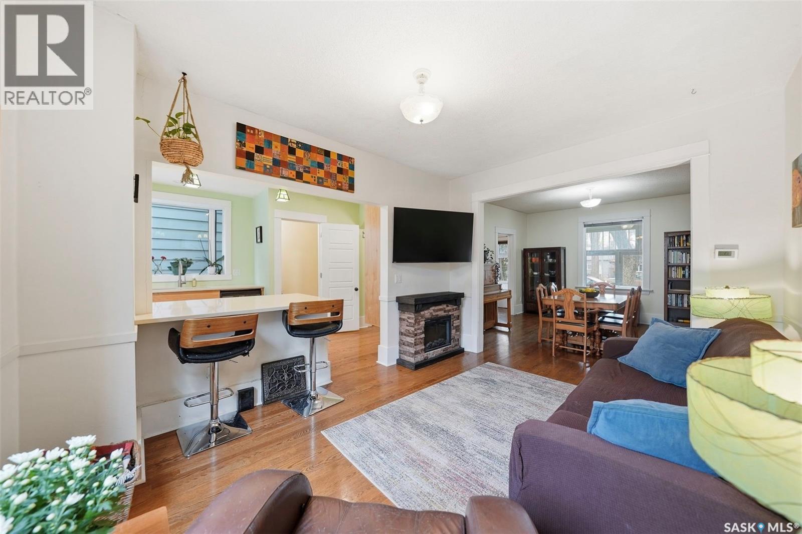 428 6Th Street E, Saskatoon, SK - Indoor Photo Showing Living Room With Fireplace