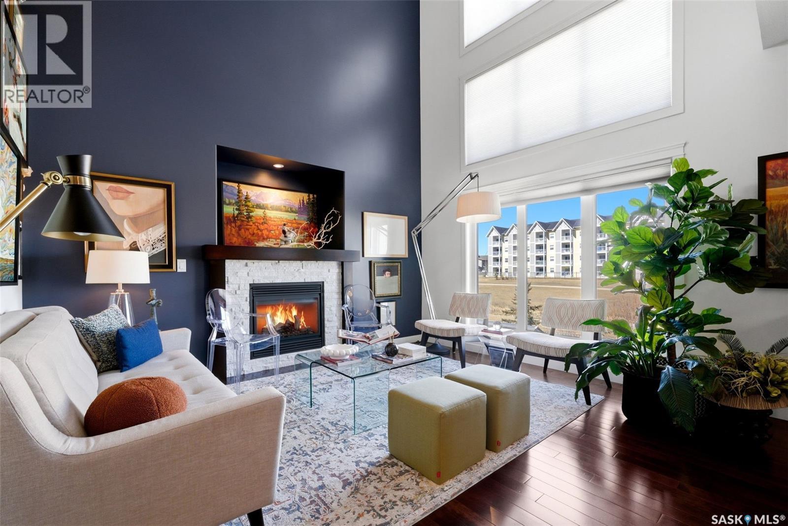 4757 Skinner Crescent, Regina, SK - Indoor Photo Showing Living Room With Fireplace
