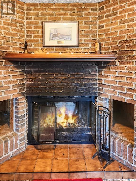 3069 Sherman Drive, Prince Albert, SK - Indoor Photo Showing Living Room With Fireplace