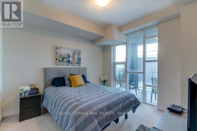 207 - 10 Concord Place, Grimsby (Grimsby Beach), ON - Indoor Photo Showing Bedroom