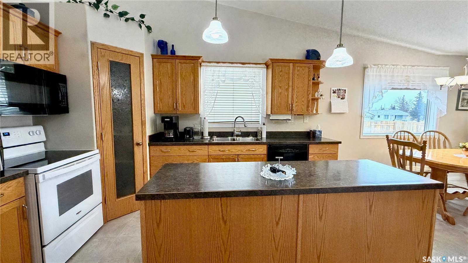 15B Downing Drive, Lanigan, SK - Indoor Photo Showing Kitchen With Double Sink