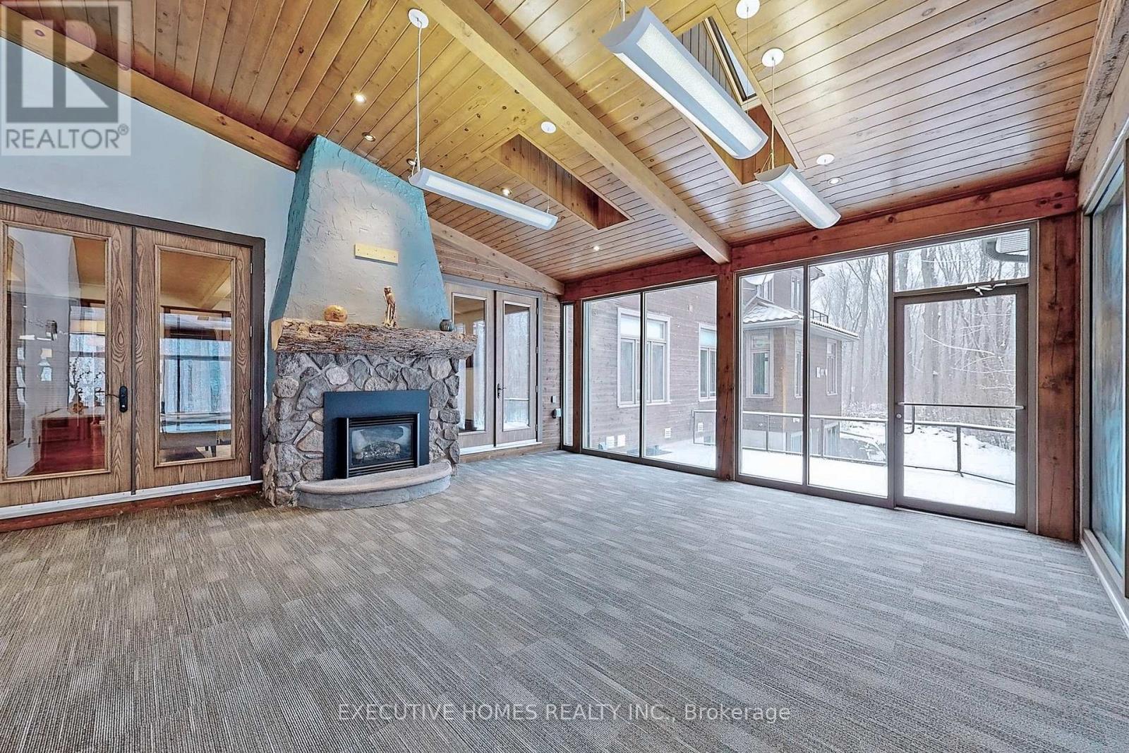 7651 Milburough Line, Milton, ON - Indoor With Fireplace