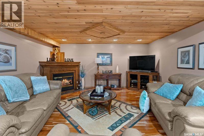 70 Cactus Drive, Saskatchewan Landing, SK - Indoor Photo Showing Living Room With Fireplace