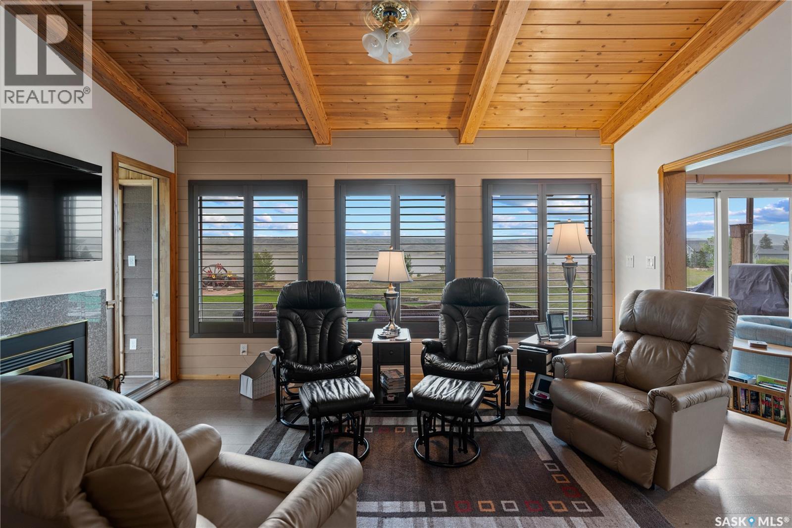 70 Cactus Drive, Saskatchewan Landing, SK - Indoor Photo Showing Living Room With Fireplace