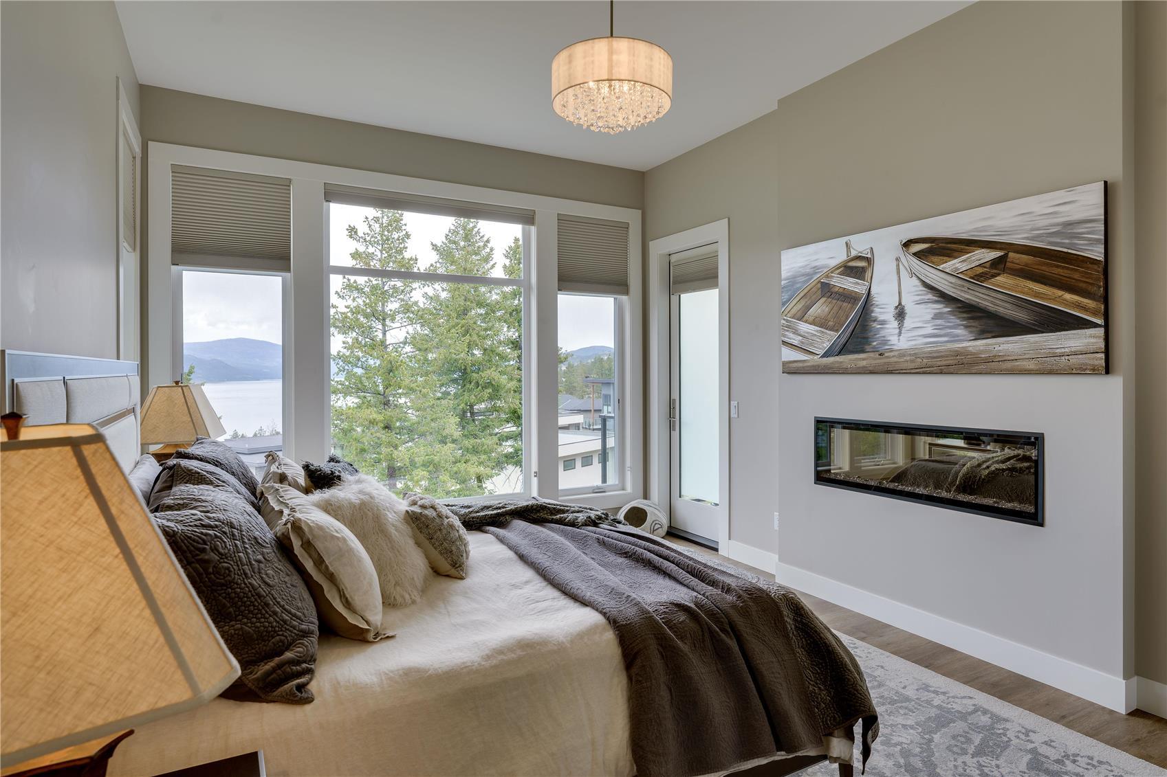 3303 Water Birch Circle, Kelowna, BC - Indoor With Fireplace