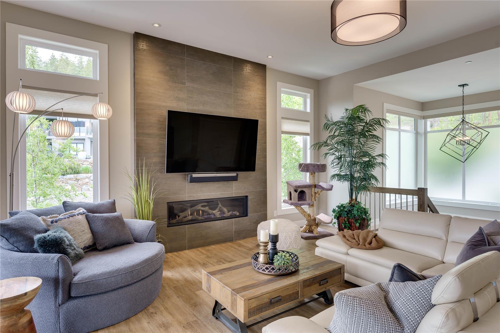3303 Water Birch Circle, Kelowna, BC - Indoor Photo Showing Living Room With Fireplace