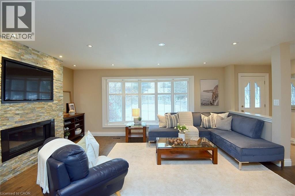 Adjacent to Dining room - 626 Vanderburgh Drive, Burlington, ON - Indoor Photo Showing Living Room With Fireplace
