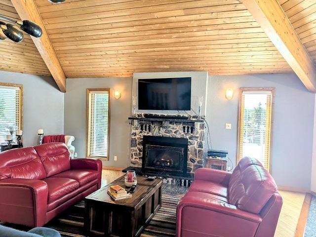 293 Ross Lapointe Road, Oxdrift, ON - Indoor Photo Showing Living Room With Fireplace