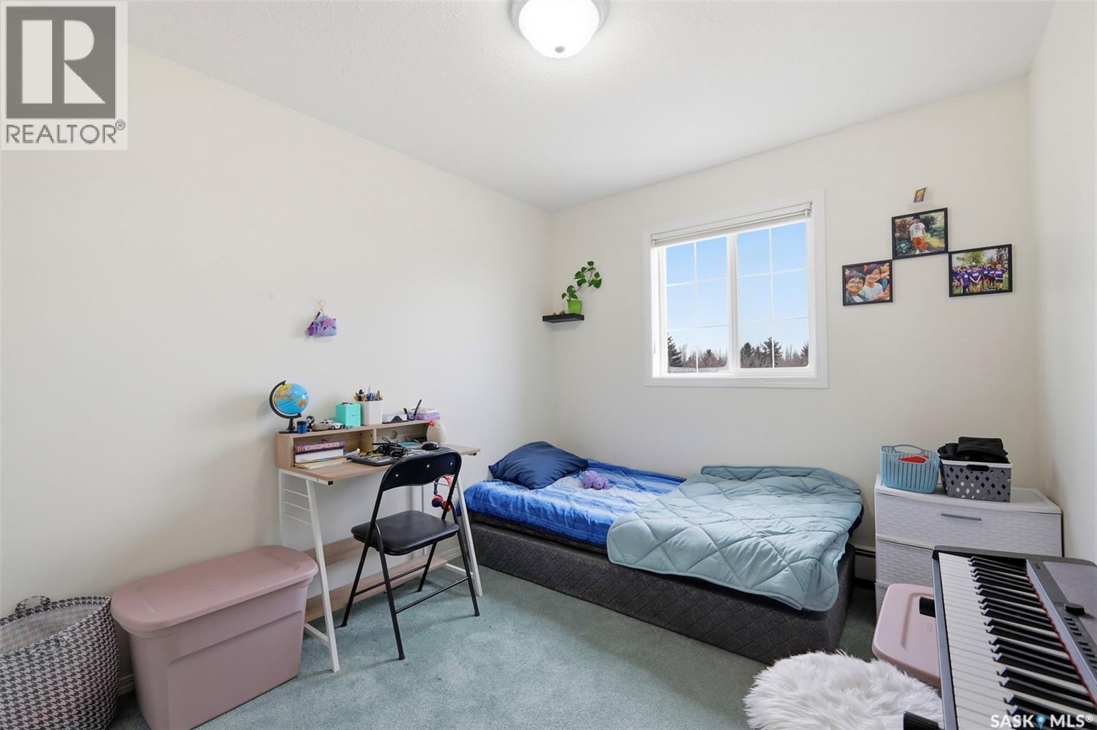 215 934 Heritage View, Saskatoon, SK - Indoor Photo Showing Bedroom