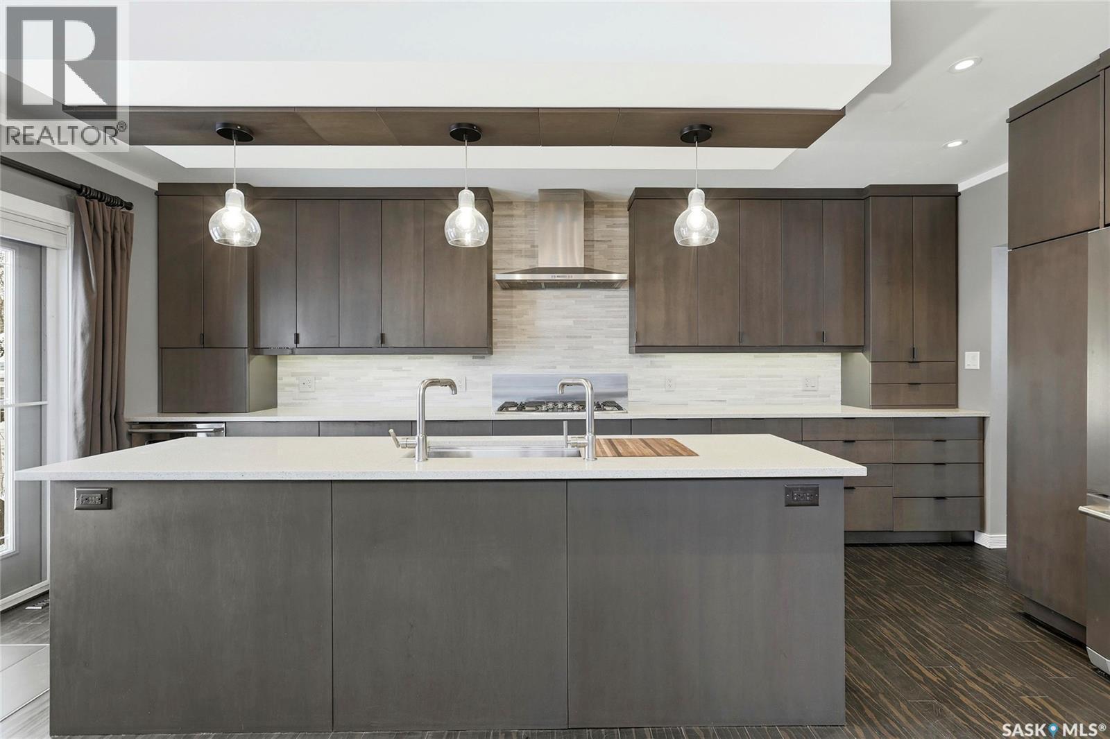 12 Secord Place, Regina, SK - Indoor Photo Showing Kitchen With Double Sink With Upgraded Kitchen
