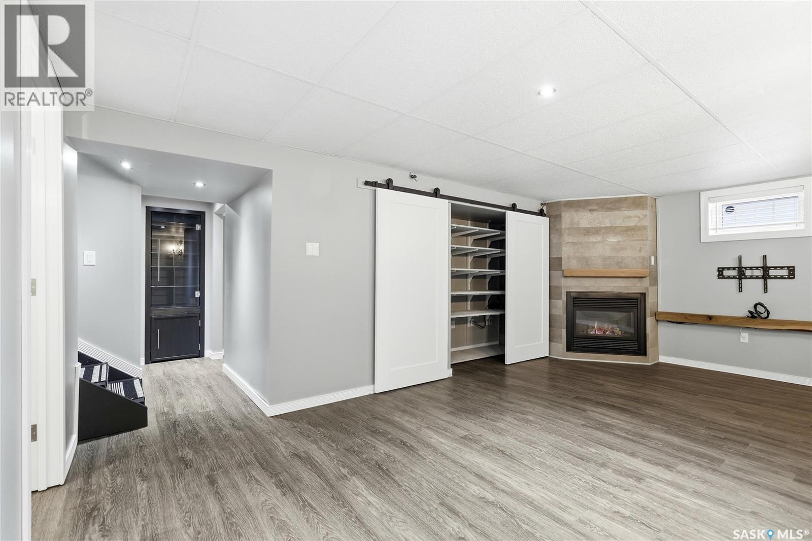 12 Secord Place, Regina, SK - Indoor With Fireplace