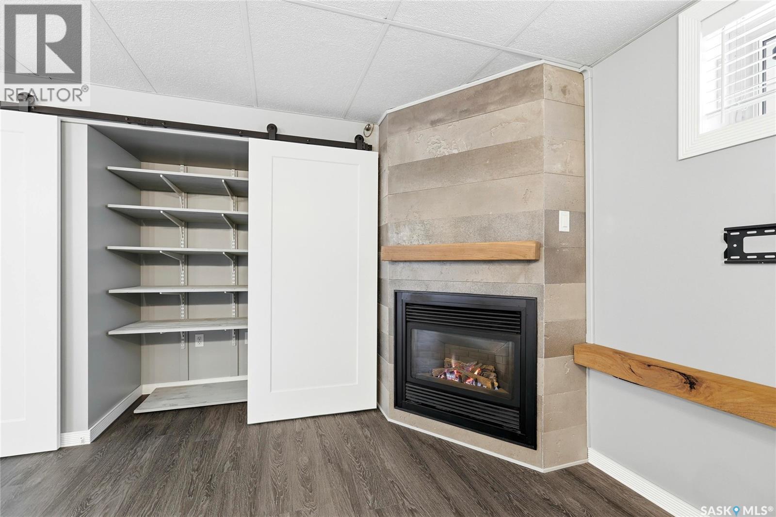 12 Secord Place, Regina, SK - Indoor With Fireplace