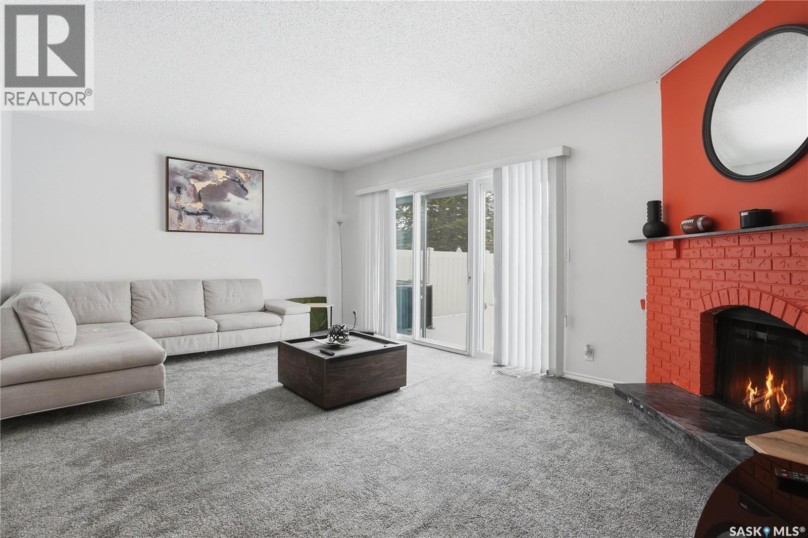 226 Plainsview Drive, Regina, SK - Indoor Photo Showing Living Room With Fireplace