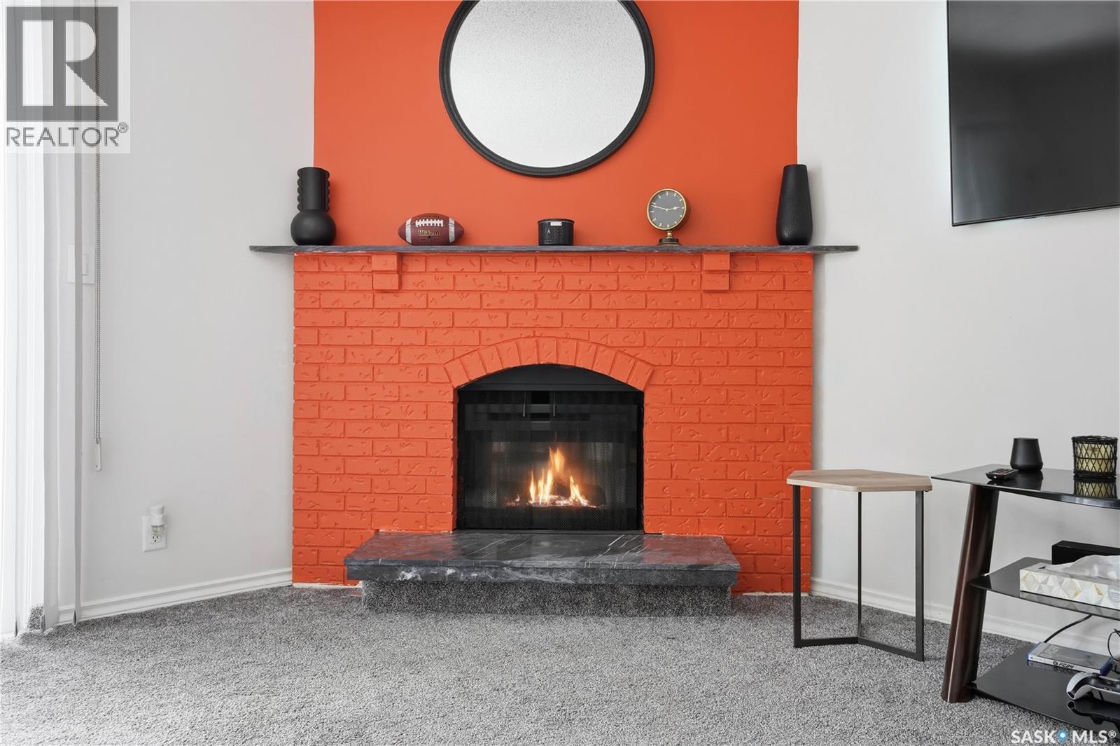 226 Plainsview Drive, Regina, SK - Indoor Photo Showing Living Room With Fireplace