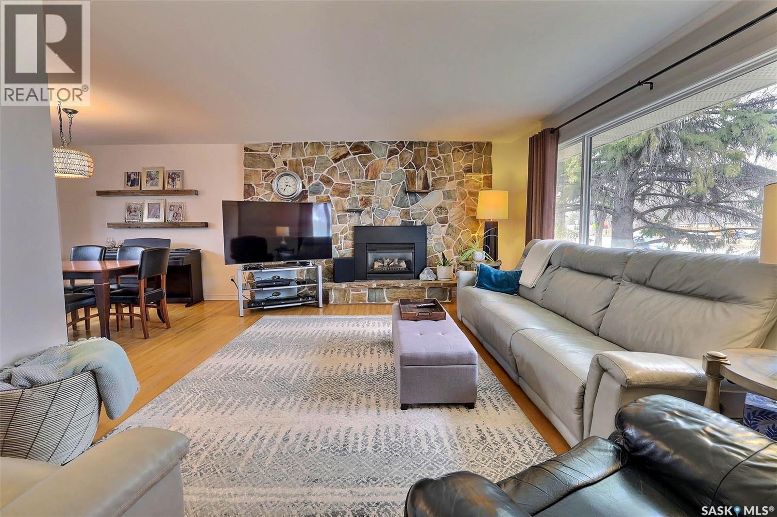 2512 Grant Road, Regina, SK - Indoor Photo Showing Living Room With Fireplace