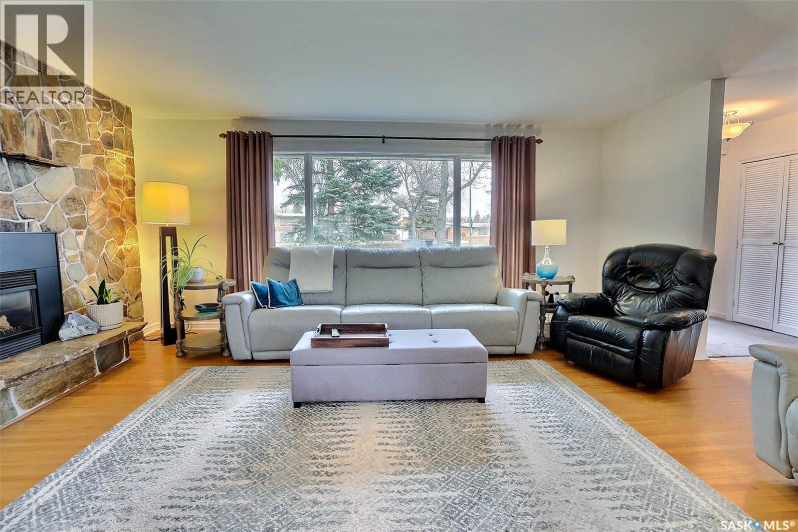 2512 Grant Road, Regina, SK - Indoor Photo Showing Living Room With Fireplace