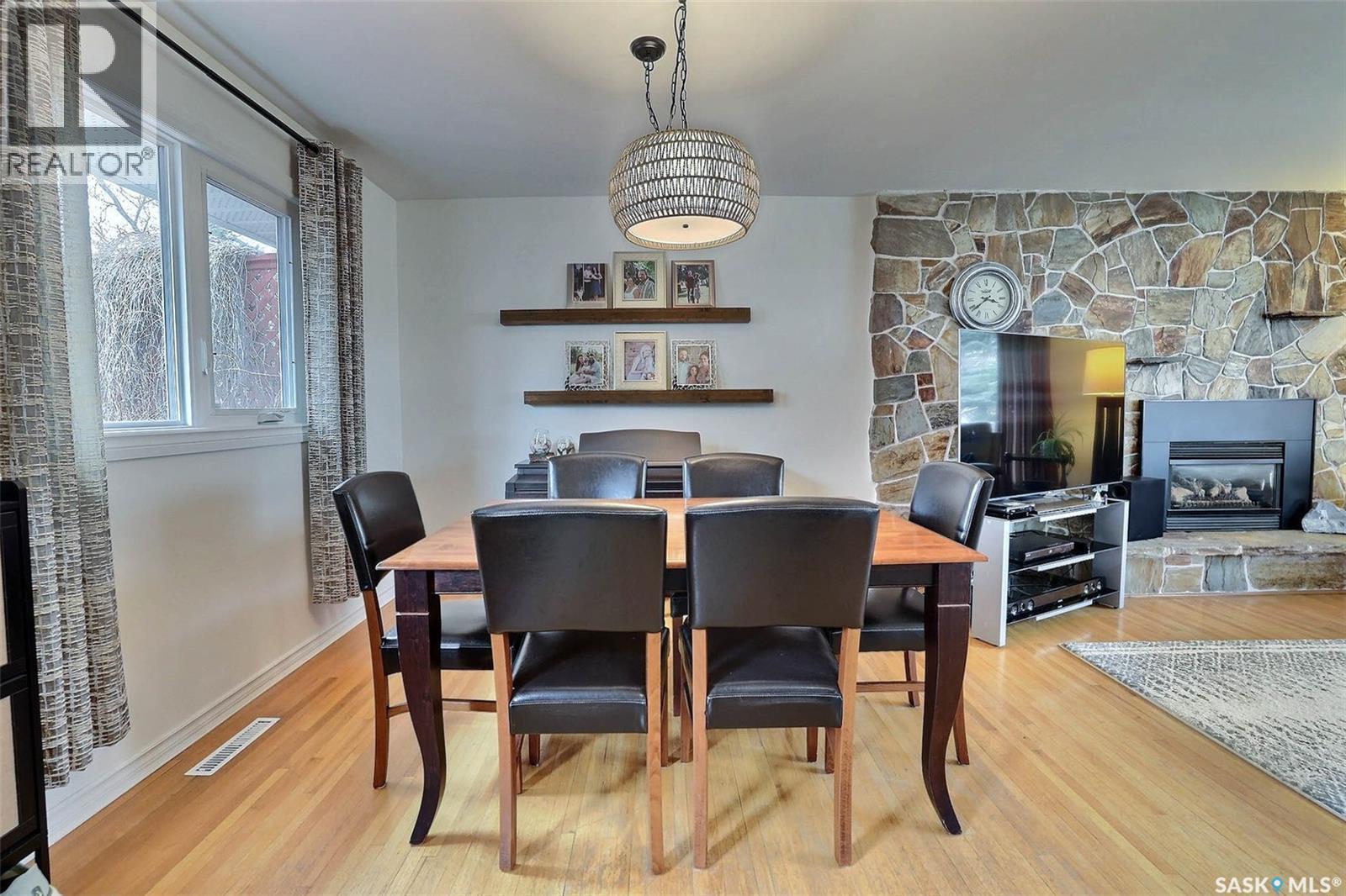 2512 Grant Road, Regina, SK - Indoor Photo Showing Dining Room With Fireplace