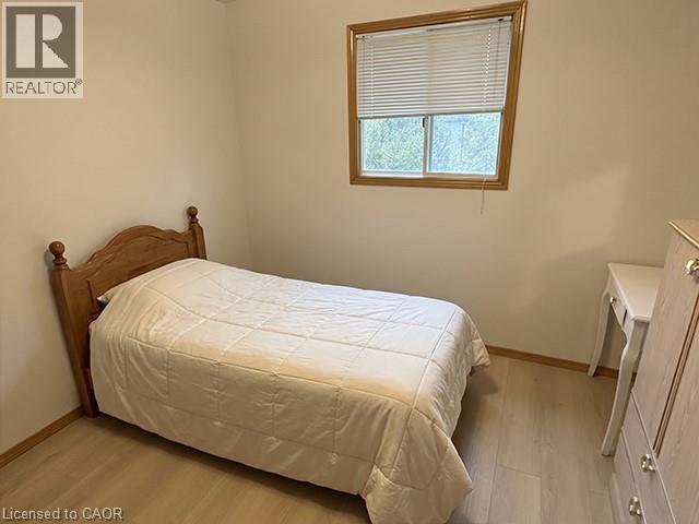 Bright room featuring light-toned walls and wood-finish flooring - 70 Bechtel Drive, Kitchener, ON - Indoor Photo Showing Bedroom
