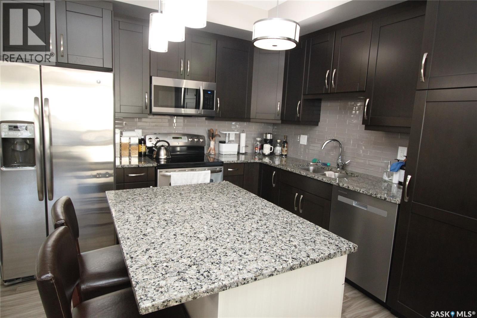 317 1035 Moss Avenue, Saskatoon, SK - Indoor Photo Showing Kitchen With Stainless Steel Kitchen With Upgraded Kitchen