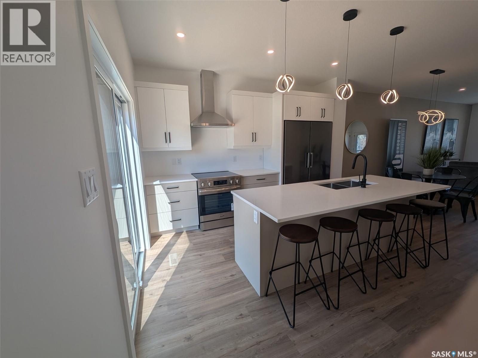 2460 Lindsay Street, Regina, SK - Indoor Photo Showing Kitchen With Double Sink With Upgraded Kitchen