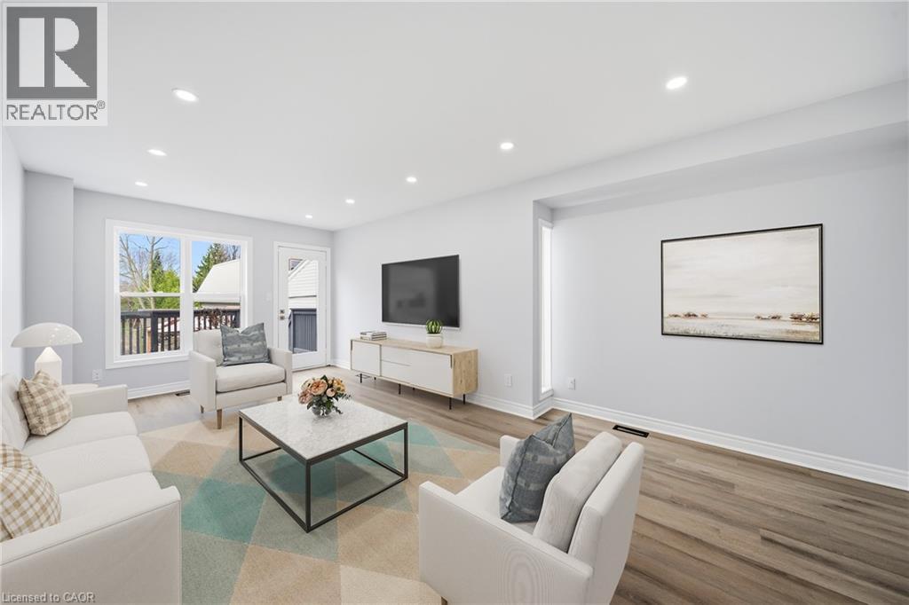 VIRTUALLY STAGED - 233B Vine Street, St. Catharines, ON - Indoor Photo Showing Living Room