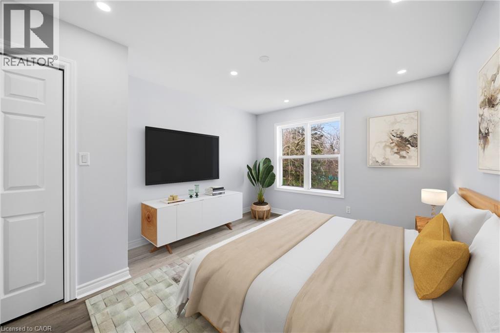 VIRTUALLY STAGED - 233B Vine Street, St. Catharines, ON - Indoor Photo Showing Bedroom