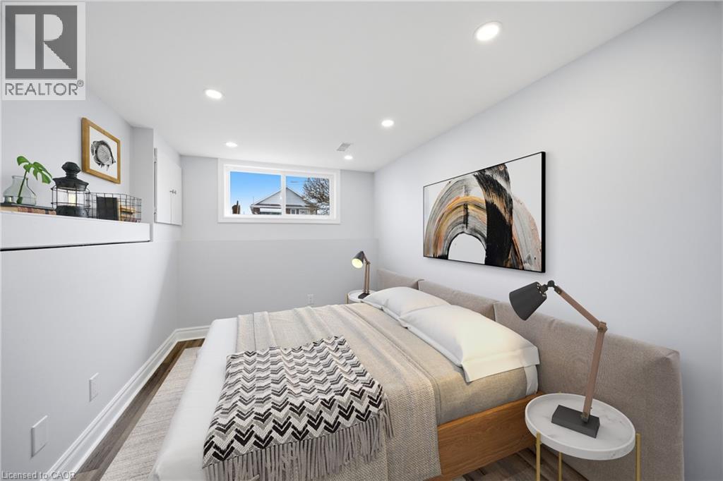 VIRTUALLY STAGED - 233B Vine Street, St. Catharines, ON - Indoor Photo Showing Bedroom