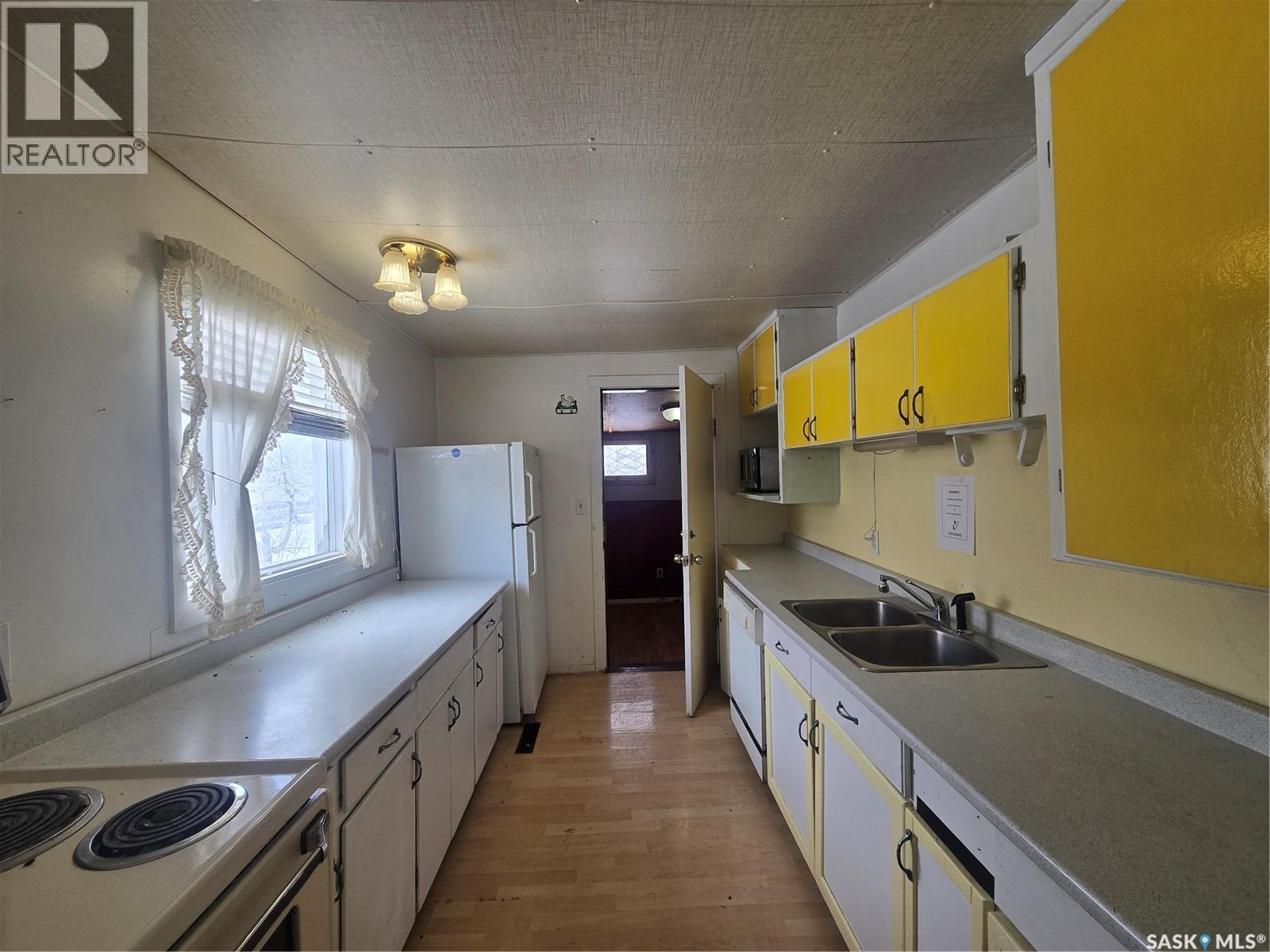803 Hall Street, Loreburn, SK - Indoor Photo Showing Kitchen With Double Sink