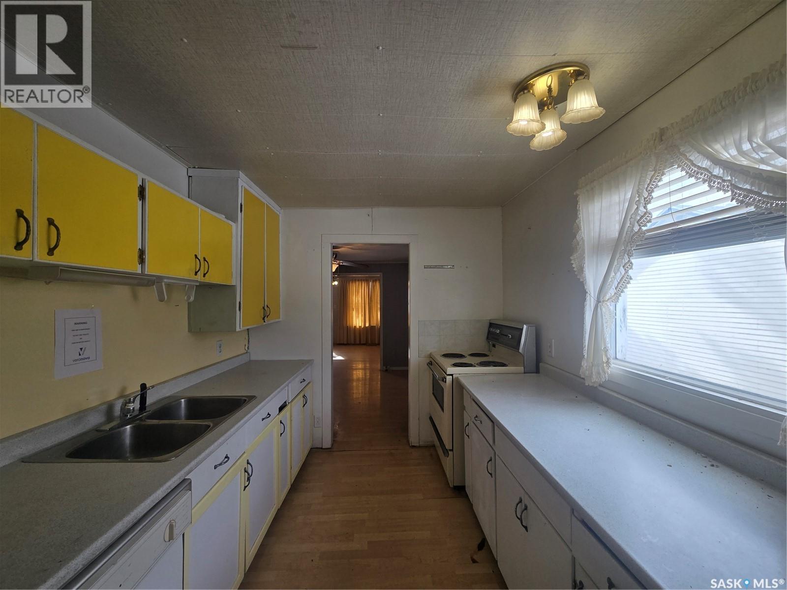 803 Hall Street, Loreburn, SK - Indoor Photo Showing Kitchen With Double Sink